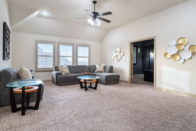 carpeted living room featuring ceiling fan and lofted ceiling