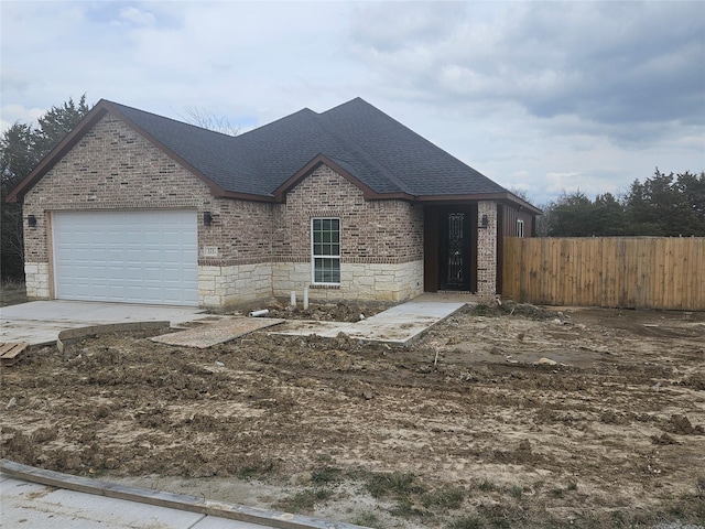 view of front of home featuring a garage