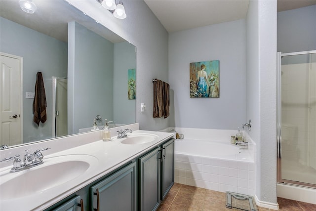 bathroom featuring vanity, independent shower and bath, and tile patterned flooring