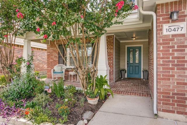 doorway to property with a porch