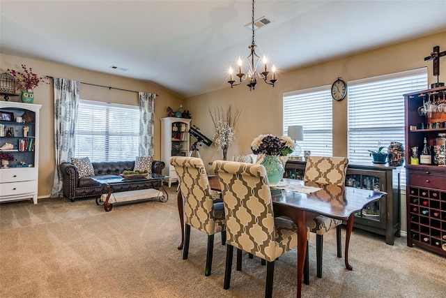 dining area with vaulted ceiling, light carpet, wine cooler, and an inviting chandelier