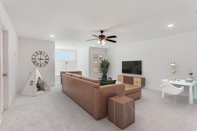 11712 Blackfoot Ct, Godley, TX 76044 - living room with light colored carpet, ceiling fan, recessed lighting, and baseboards