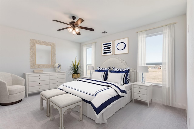 11712 Blackfoot Ct, Godley, TX 76044 - bedroom featuring light colored carpet and a ceiling fan