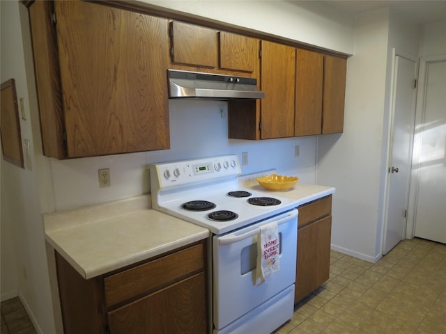 kitchen featuring white electric stove