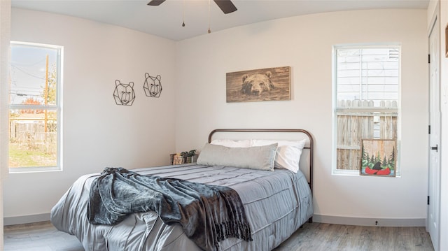 bedroom featuring ceiling fan and light wood-type flooring