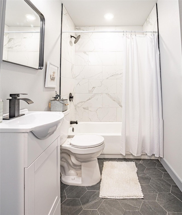 full bathroom with tile patterned flooring, shower / bath combination with curtain, vanity, and toilet