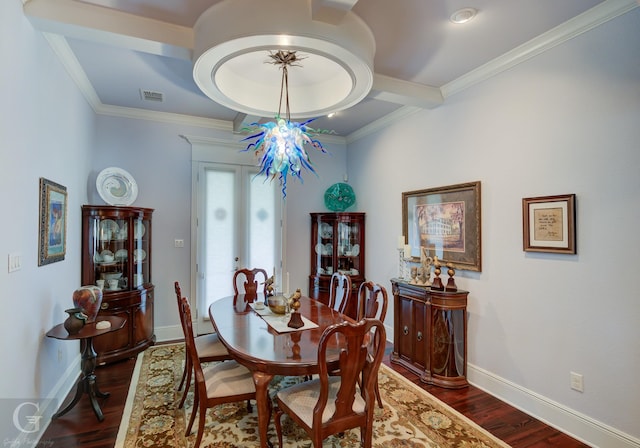 dining room with french doors, dark hardwood / wood-style floors, and crown molding