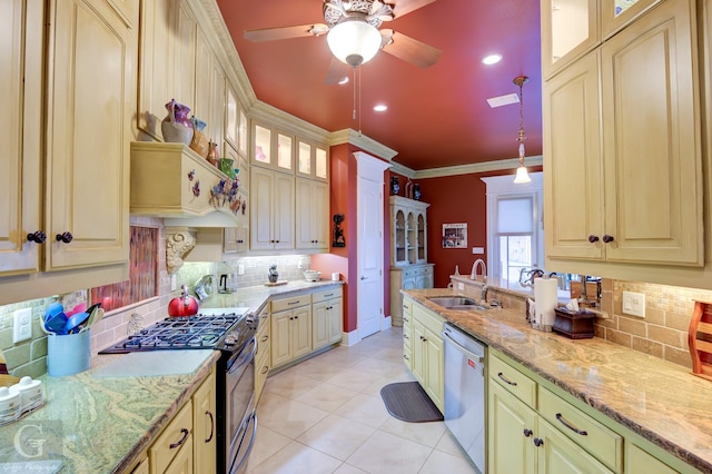 kitchen featuring decorative backsplash, stainless steel appliances, crown molding, sink, and hanging light fixtures