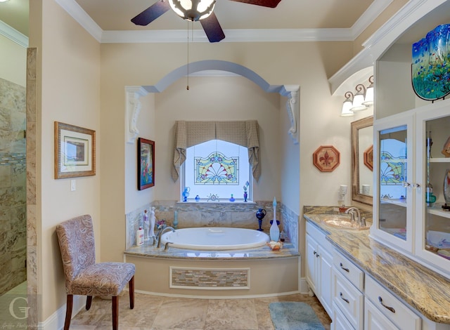 bathroom featuring ceiling fan, plus walk in shower, vanity, and ornamental molding