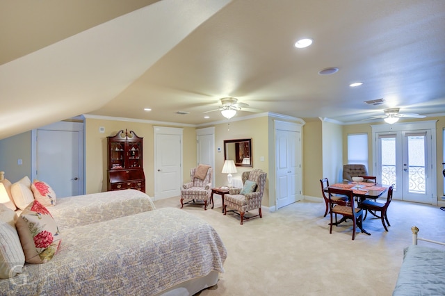 carpeted bedroom featuring access to exterior, ceiling fan, french doors, lofted ceiling, and ornamental molding