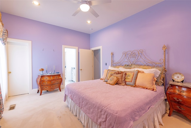 carpeted bedroom with ceiling fan