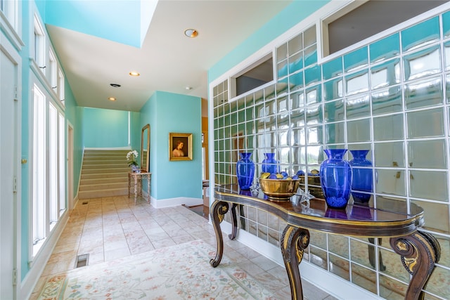 interior space featuring plenty of natural light and tile patterned flooring