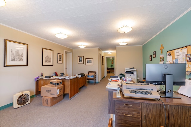 carpeted home office featuring a textured ceiling and ornamental molding