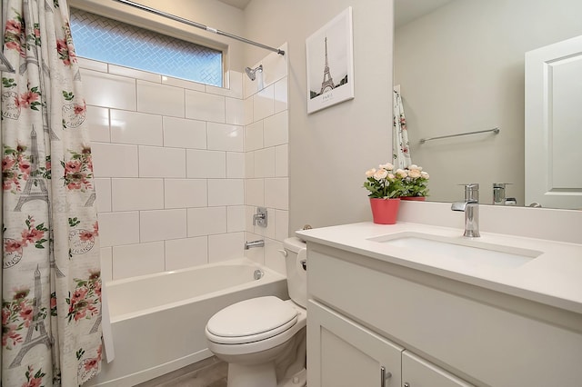 full bathroom with vanity, shower / bath combination with curtain, and toilet