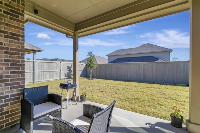 view of patio with a fenced backyard