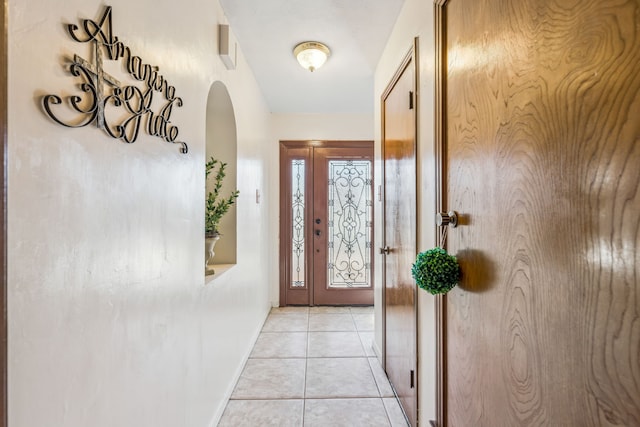 foyer with light tile patterned floors