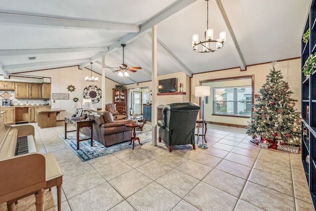 living room featuring vaulted ceiling with beams, ceiling fan with notable chandelier, light tile patterned floors, and a fireplace