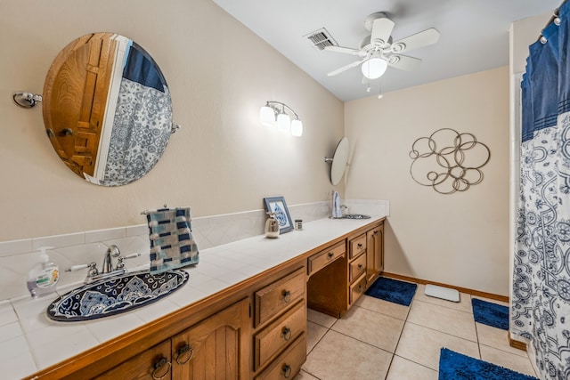 bathroom with tile patterned floors, ceiling fan, and vanity