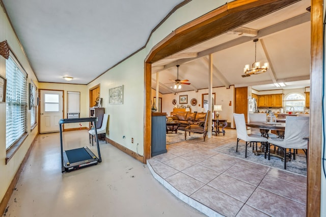 interior space with light tile patterned floors, ceiling fan with notable chandelier, and vaulted ceiling