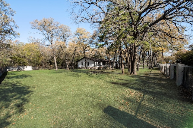 view of yard featuring fence