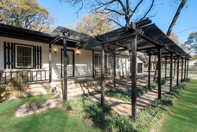 exterior space featuring a pergola and covered porch