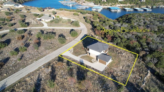 1186 Rawhide Rdg, Possum Kingdom Lake, TX 76449 - aerial view of property's location featuring a large body of water, property parcel outlined, and numerous boat docks