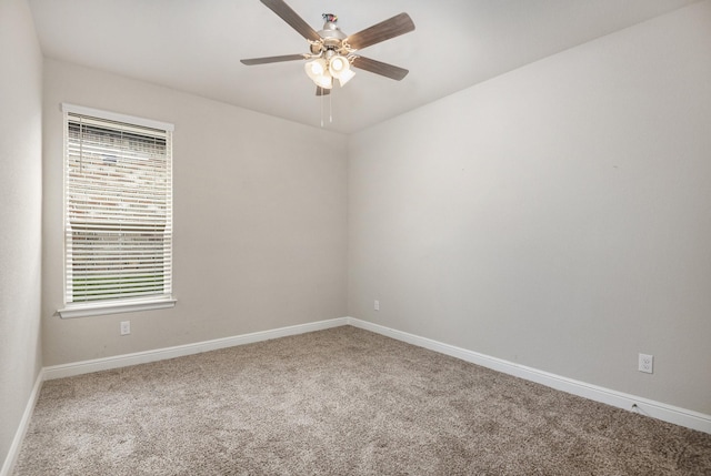 unfurnished room with carpet flooring and ceiling fan