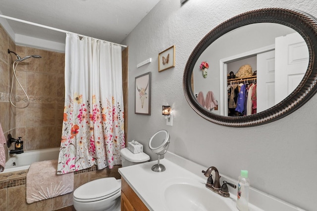 full bathroom with vanity, toilet, and shower / tub combo