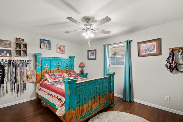 bedroom featuring ceiling fan and dark wood-type flooring