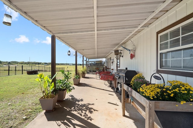 view of patio featuring area for grilling and a rural view