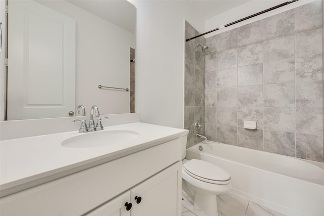 bathroom featuring toilet, vanity, and shower / bathtub combination