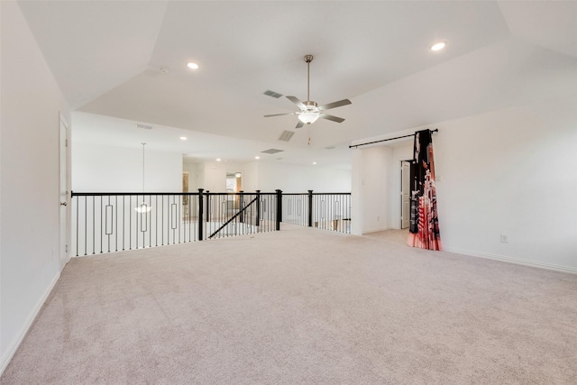 empty room with ceiling fan, light carpet, baseboards, and recessed lighting