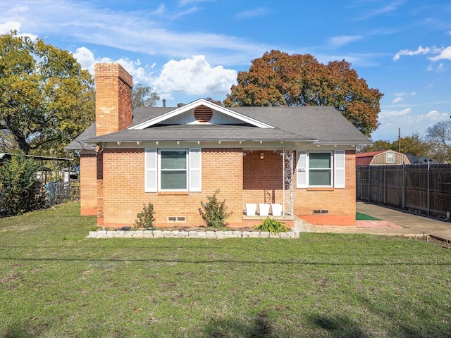 exterior space with a patio and a front yard