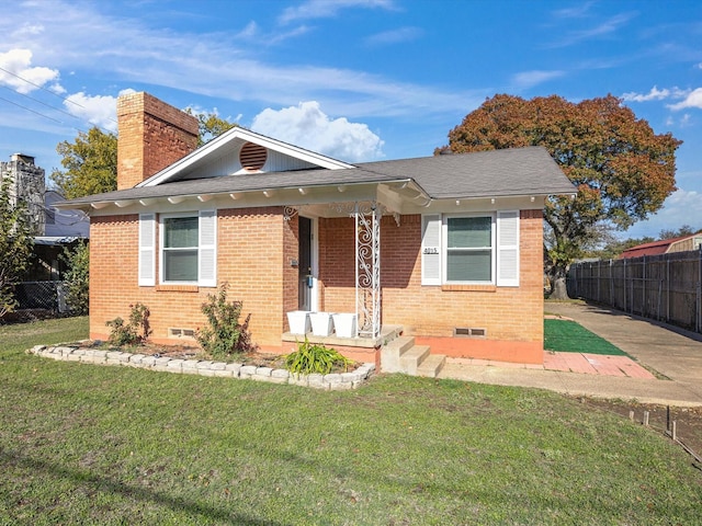 bungalow-style house featuring a front yard