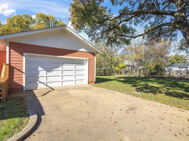 garage with a yard