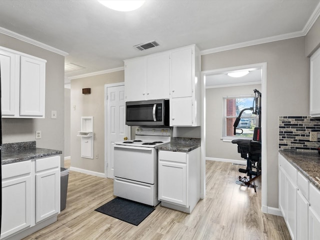 kitchen with white range with electric cooktop, white cabinetry, light hardwood / wood-style flooring, and decorative backsplash