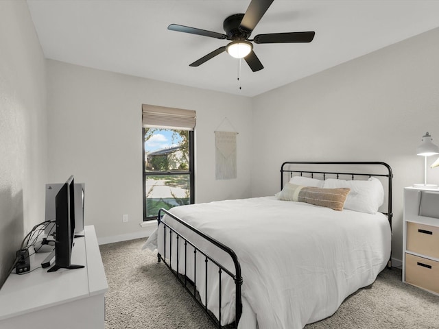 bedroom with ceiling fan and carpet flooring