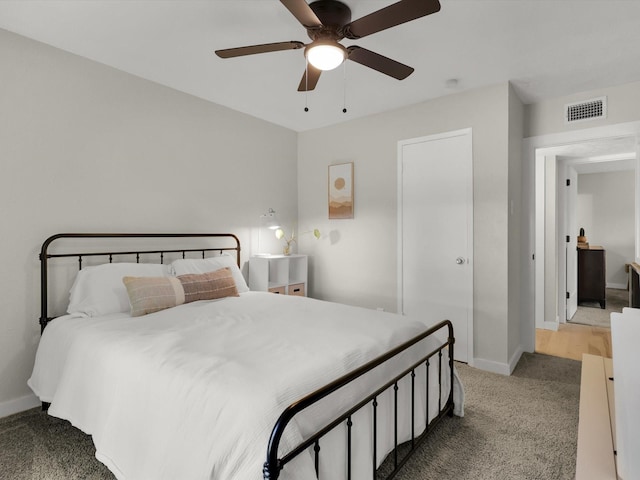 carpeted bedroom featuring ceiling fan