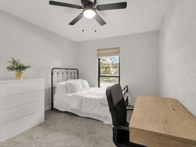 bedroom with ceiling fan and carpet