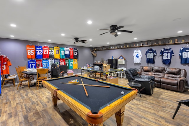 playroom with hardwood / wood-style flooring, ceiling fan, and pool table