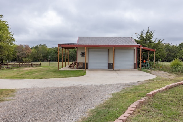 garage with a yard