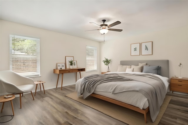 bathroom featuring hardwood / wood-style flooring, vanity, an enclosed shower, and a textured ceiling