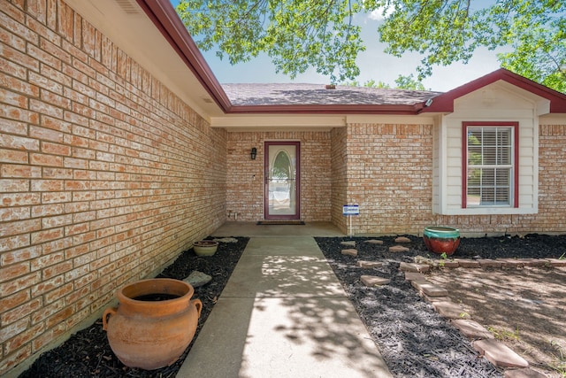 ranch-style home featuring a garage