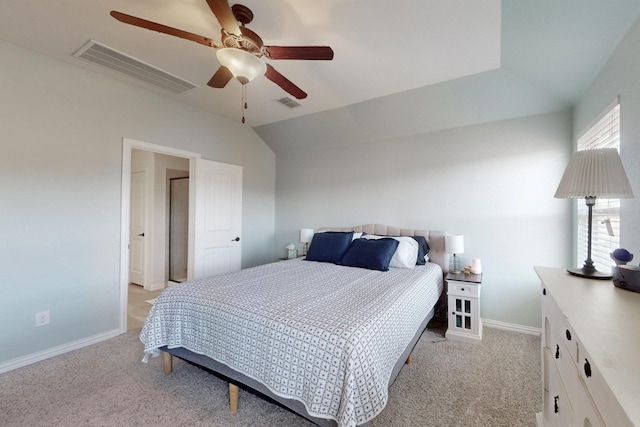 carpeted bedroom with lofted ceiling and ceiling fan