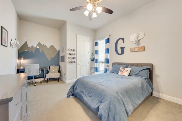 bedroom featuring ceiling fan and light carpet