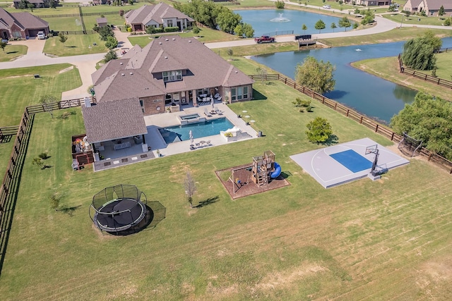 bird's eye view with a water view