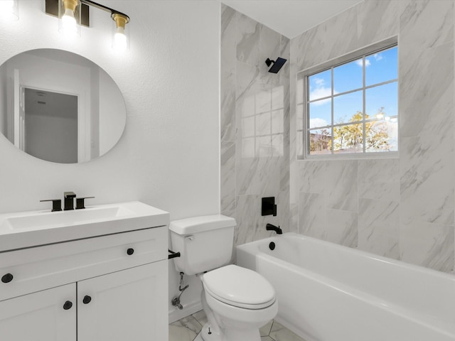 full bathroom featuring vanity, toilet, and tiled shower / bath