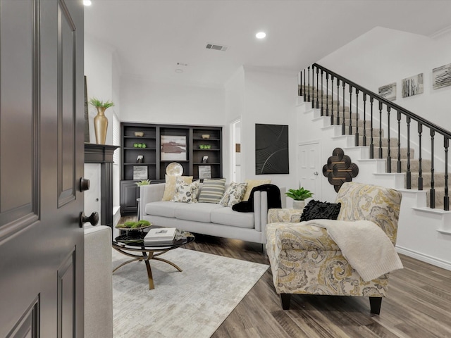 living room featuring dark wood-type flooring