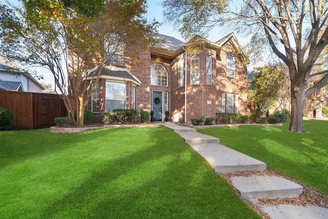 view of front of home with a front lawn