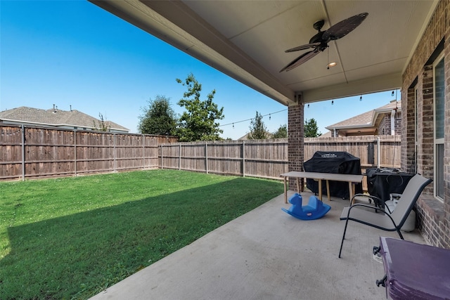 view of patio / terrace featuring ceiling fan